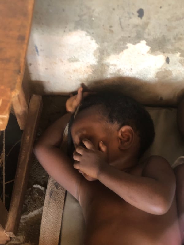 Children resting and studying in Ukwu-Abwa, Nigeria