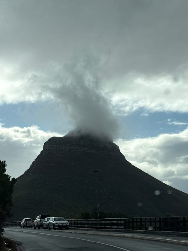 Cape Town mountains shrouded in clouds during overcast afternoon
