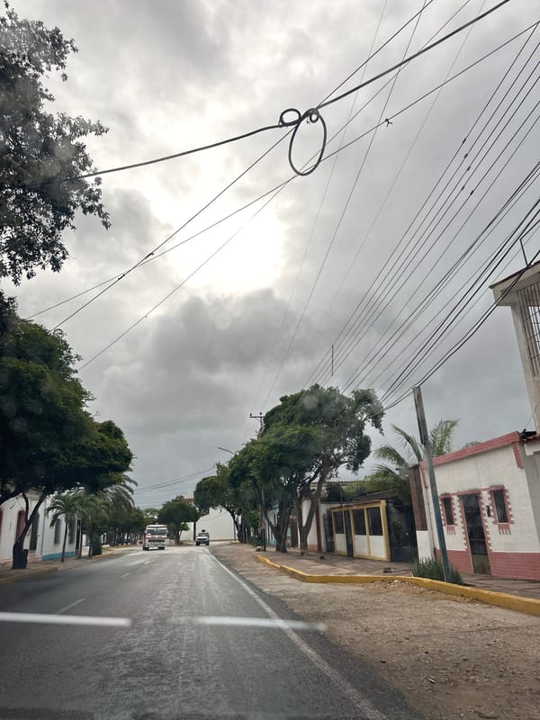 Rainy evening drive through Santa Ana, Venezuela streets