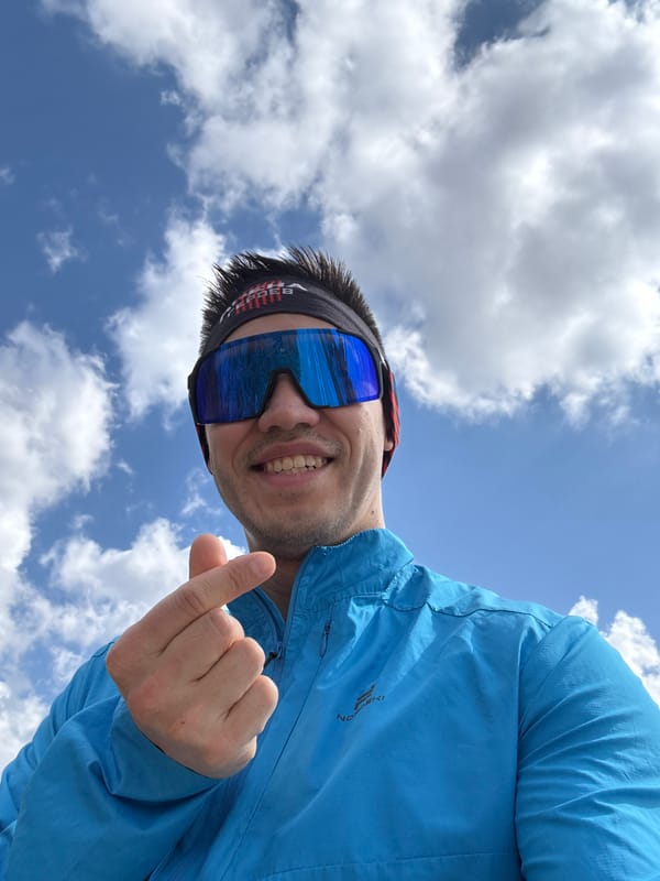 Man takes cheerful selfies under blue sky in Kazan