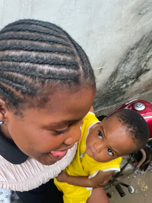 Mother and baby share tender moment in Badagry
