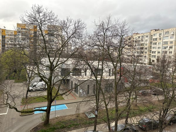 Sofia residents document street view and notebook setup
