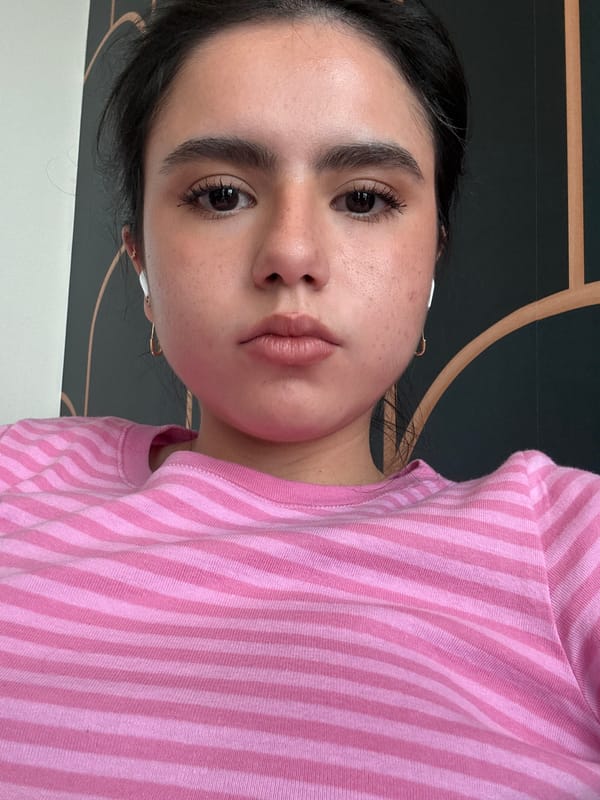 Woman takes mirror selfie in Austin apartment