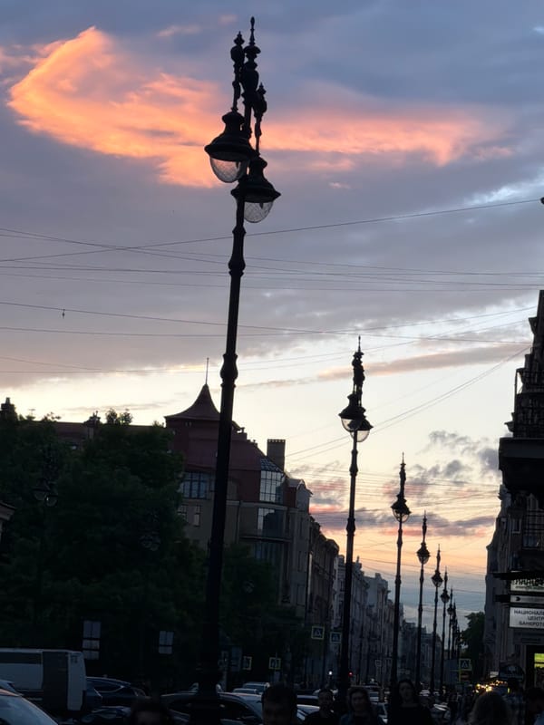 Sunset colors paint sky over Nevsky Prospect in Saint Petersburg
