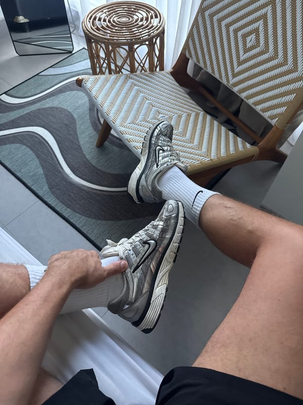 Tourist takes mirror selfies in North Kuta hotel room