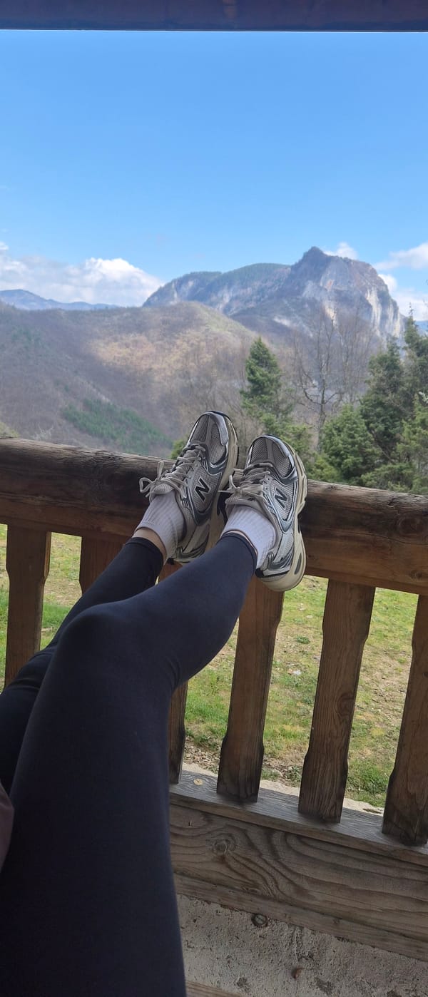 Runner takes rest break on mountain balcony in Bulgaria
