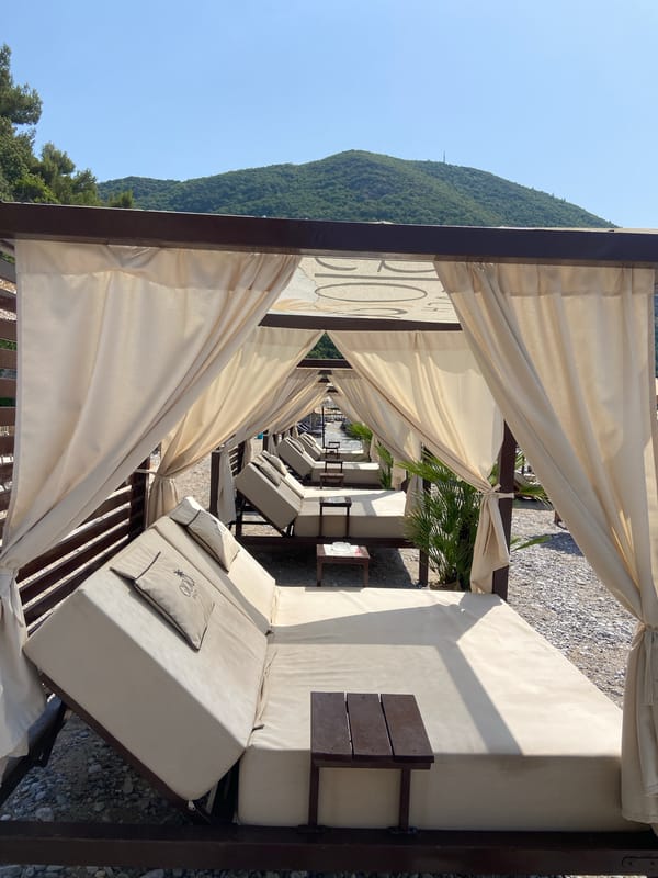 Lazy summer morning on a Montenegrin pebble beach