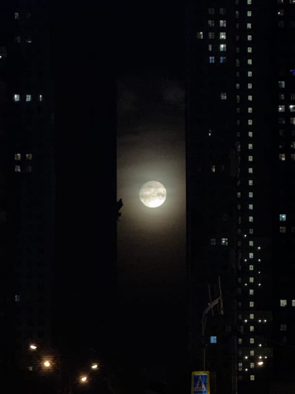Full moon over Krasnogorsk on a clear June night