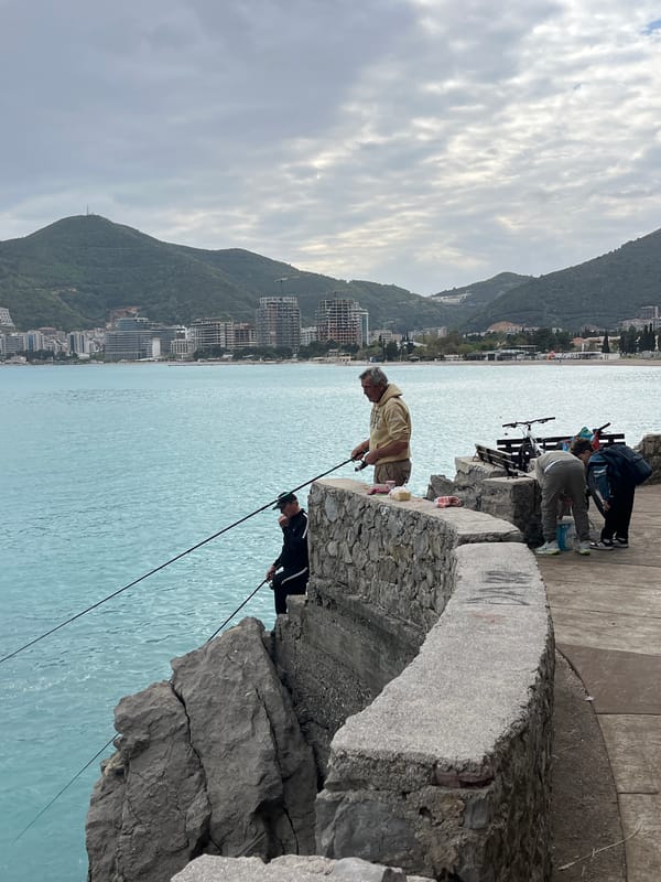 Fishing group spotted along Budva coastline amid choppy seas