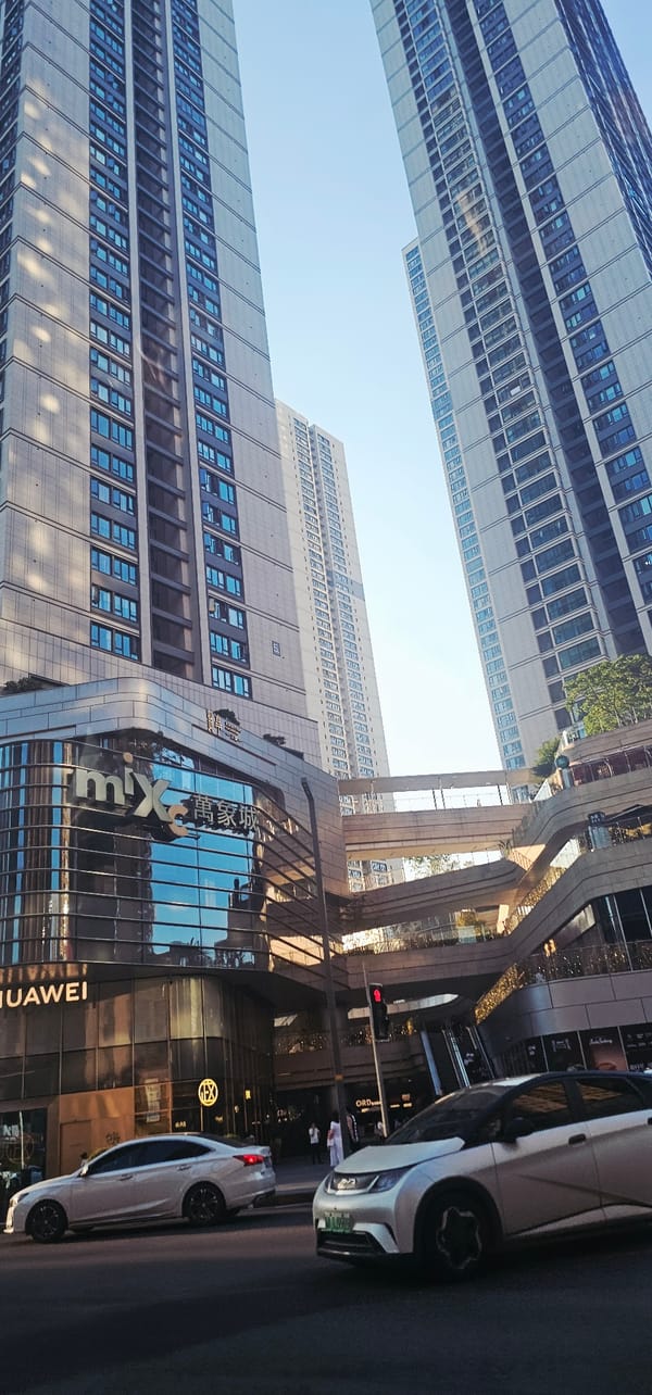 Street, mall, and skyline life across Jiulongpo District, Chongqing