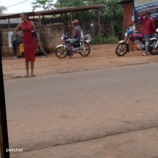 Morning tailoring work captured in Nigerian commercial district