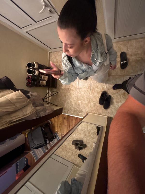 Couple takes selfies in hotel room in Tsarevo, Bulgaria