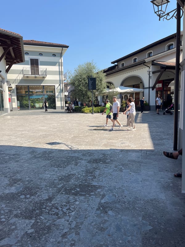 Browsing a Rodengo outlet mall across Puma, Adidas, and more