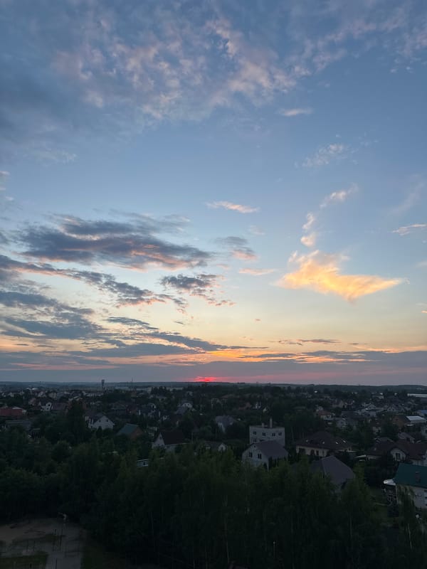 Solstice sunset aerial over suburban Minsk outskirts, Belarus