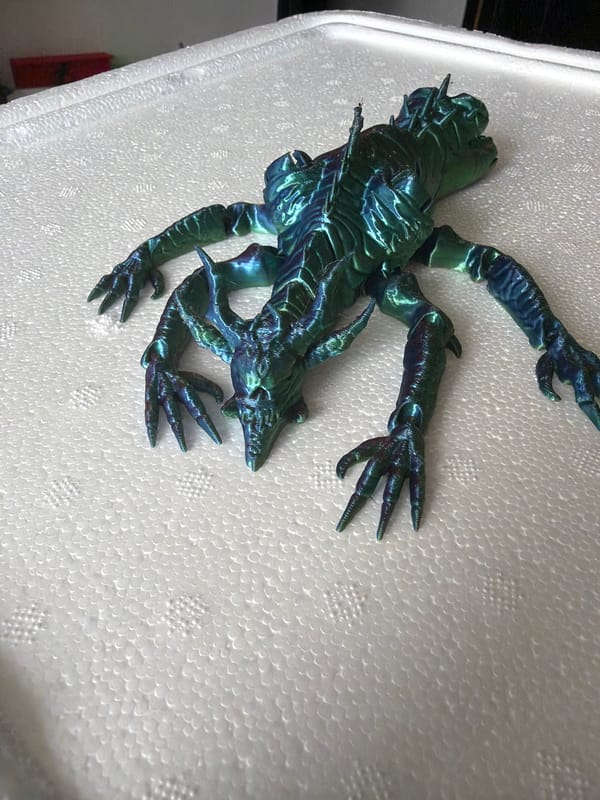 3D printing hobbyist creates figurines during afternoon session