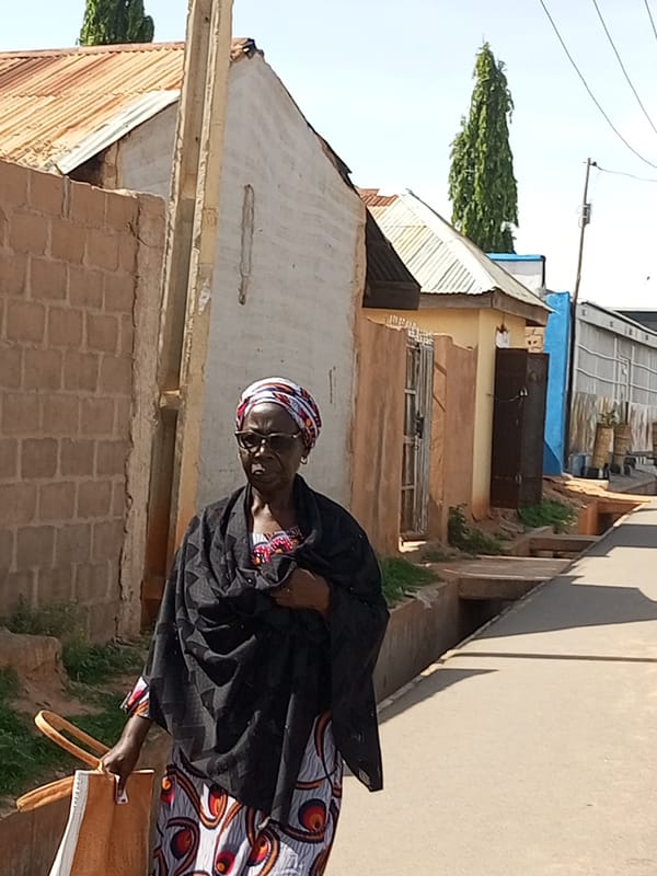 Everyday street life moving through Tempure, Nigeria