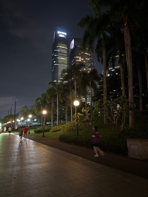 Tourist photographed at Pearl River waterfront in Guangzhou