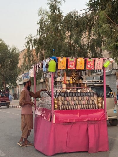 Daily street commerce continues in Kandahar amid summer heat