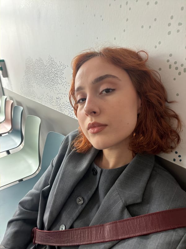 Woman photographed in Strasbourg medical building waiting area