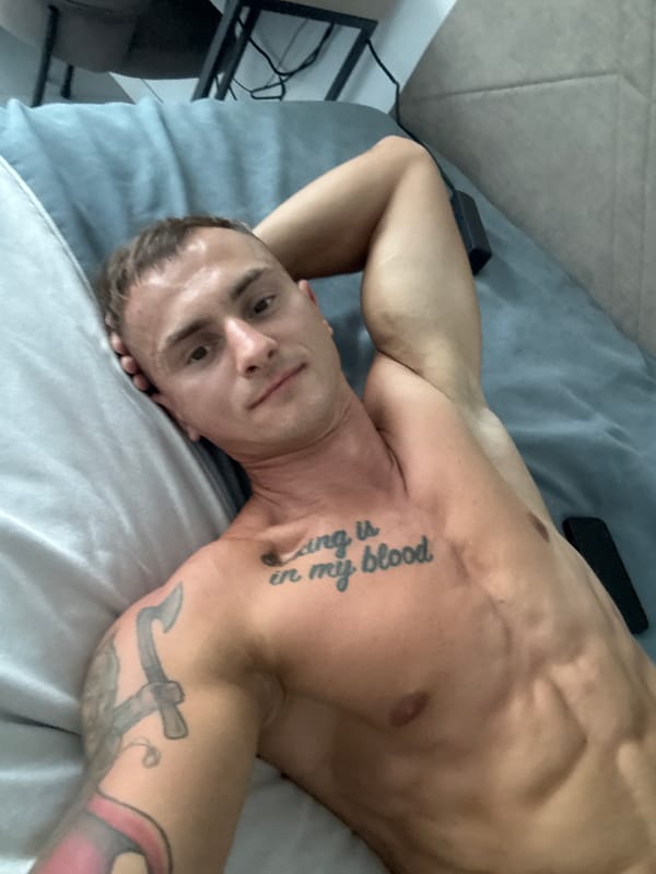 Chilling shirtless on a sofa in Finestrat