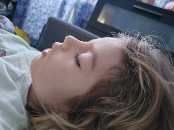 Child photographed sleeping indoors in Khimki, Russia