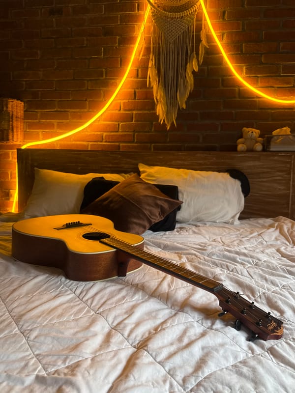 Acoustic guitar spotted in cozy North Kuta bedroom