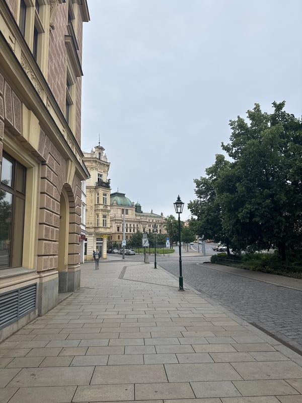 Morning street scenes documented across central Pilsen under overcast skies