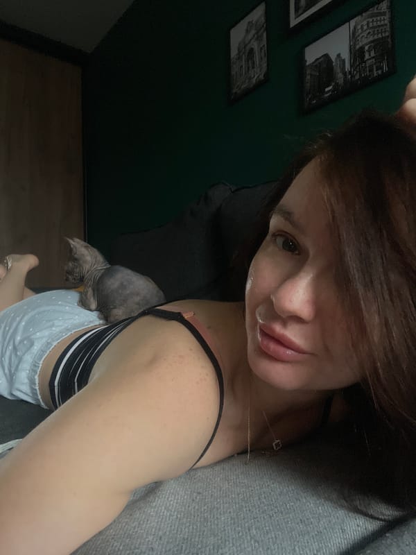 Quiet domestic moments shared between woman and cat in Kazan