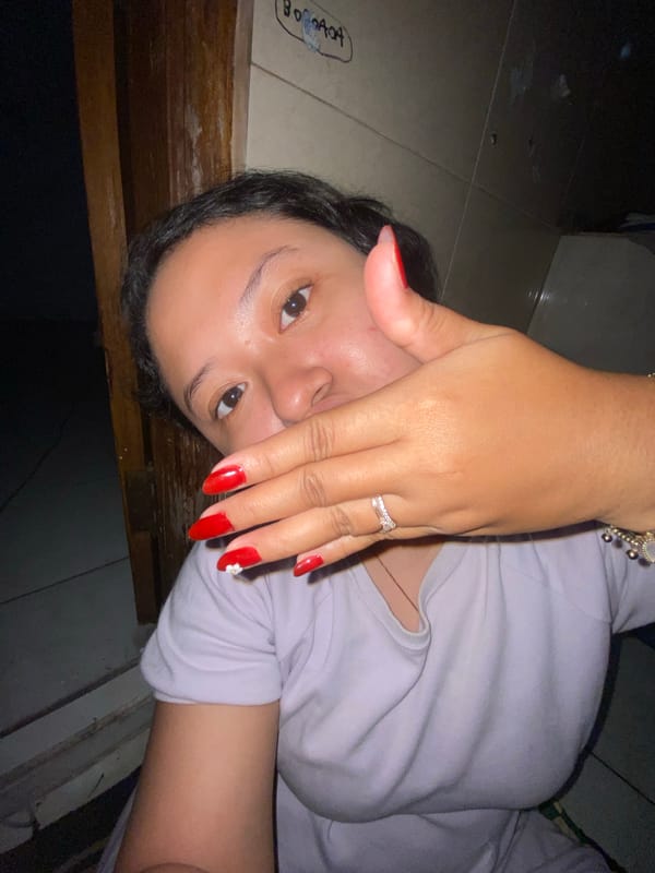 Person documented in selfie session with decorative accessories Indonesia
