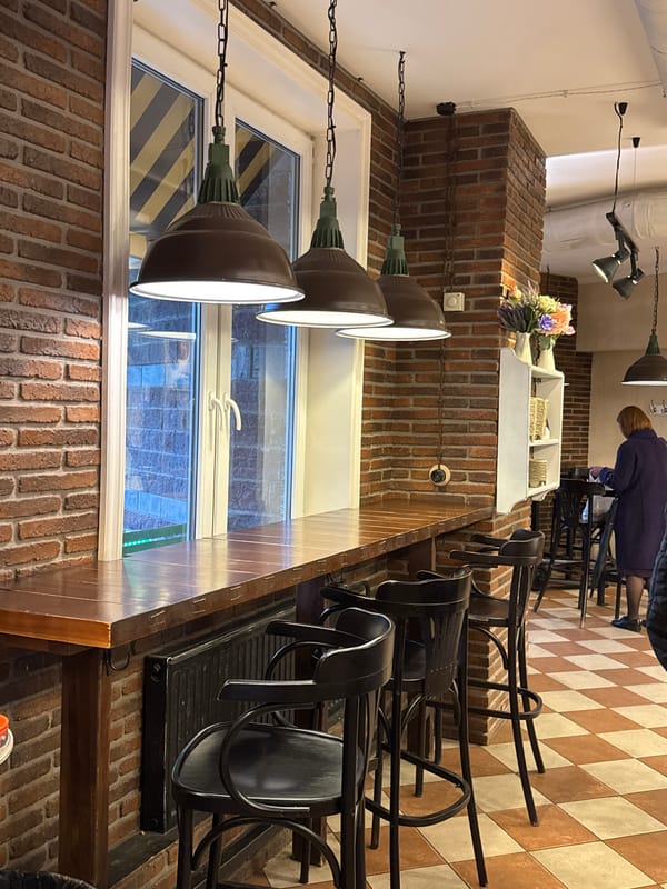Urban witness documents cafe, bakery, bridge journey in evening