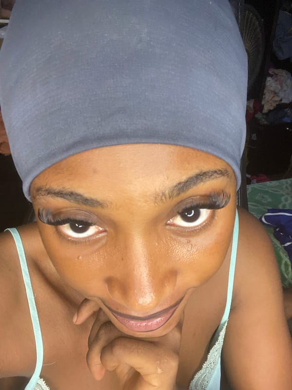 Selfie session with red wine in a Kubwa bedroom