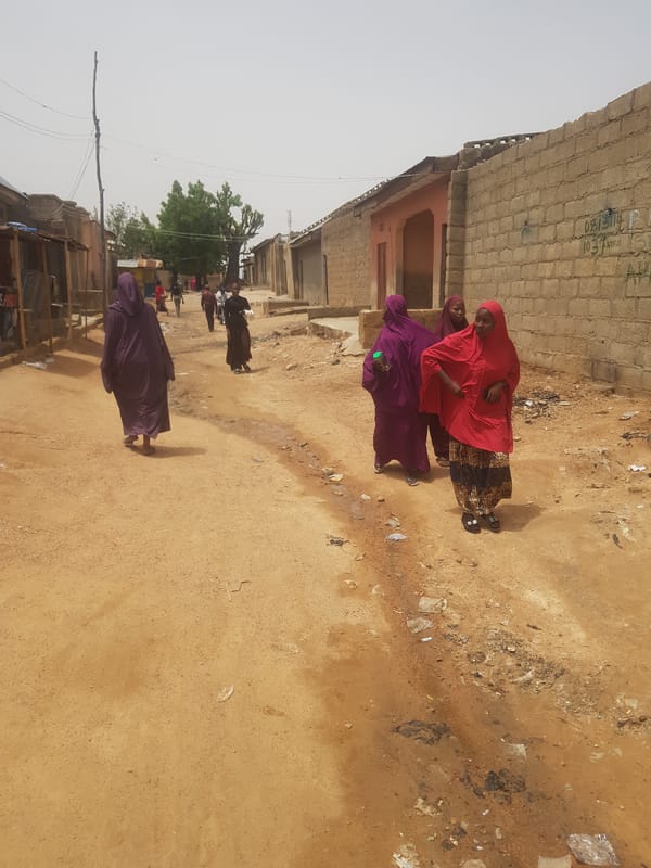 Daily life documented on dirt streets of Dabawa, Nigeria