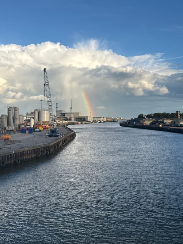 Evening bridge visit captures Great Yarmouth harbor views with rainbow