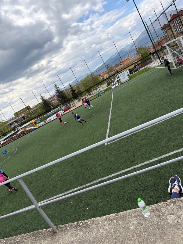 Soccer game observed on field in Debren, Bulgaria