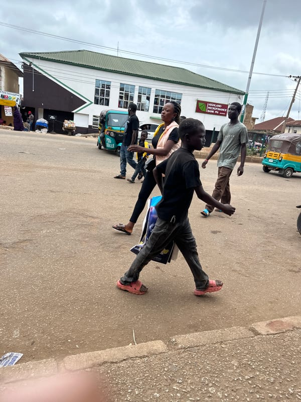 Street commerce and daily movement through Bukuru market, Nigeria