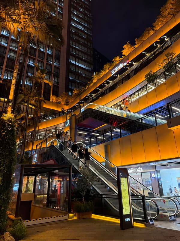 Illuminated commercial complex at night in Panyu District