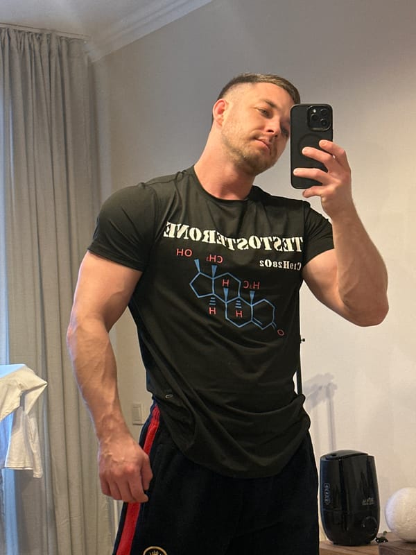 Man takes flexing selfies in mirror in Perm, Russia