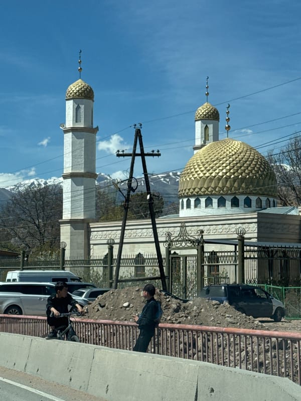 Mosque documented in Бактуу-Долоноту, Kyrgyzstan with golden domes