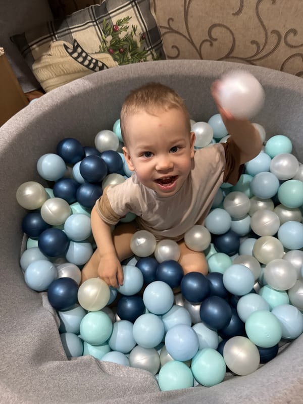 Child plays in indoor play area in Rusanovo