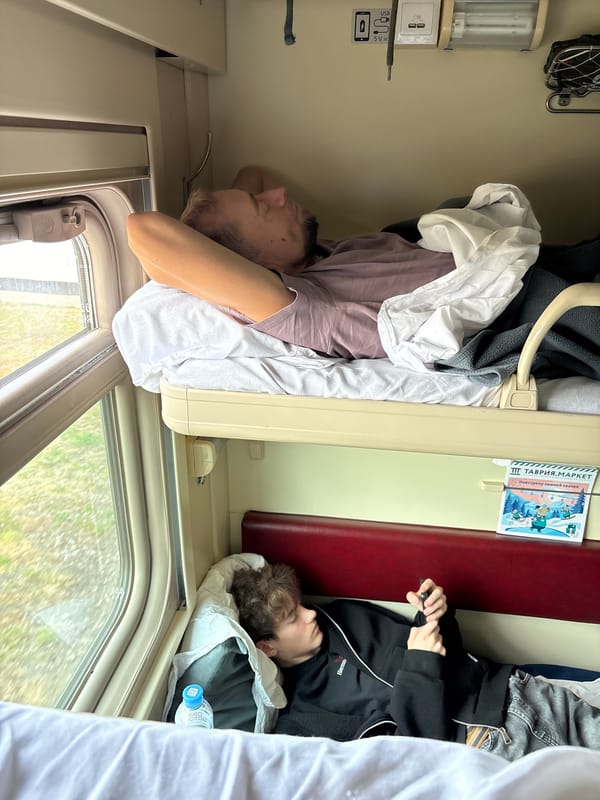 Passengers sleep in bunks on train near Dzhankoy, Ukraine