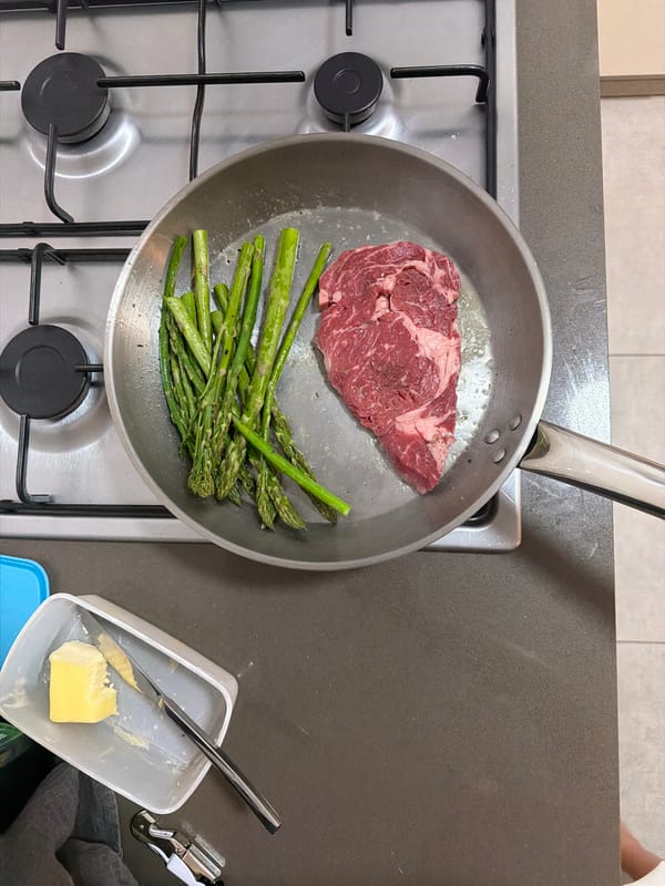 Home cook prepares ribeye steak in Holon kitchen