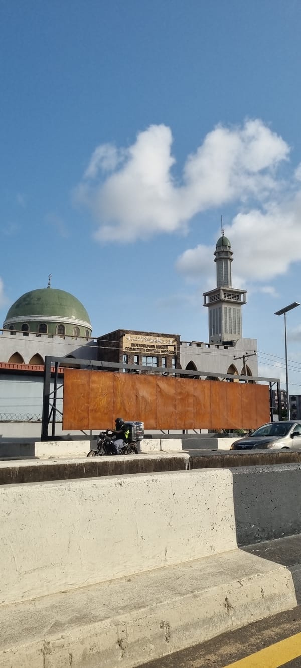 Falomo Central Mosque photographed against cloudy sky in Nigeria