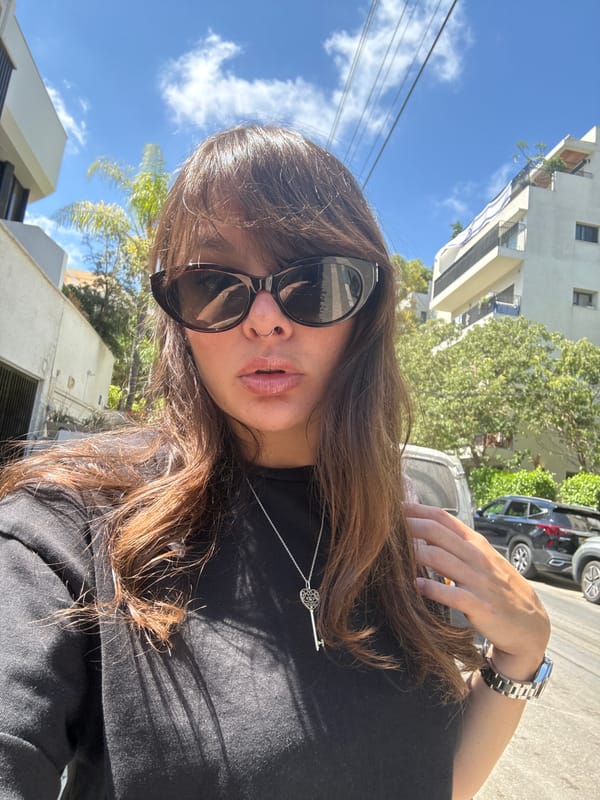 Street selfie and parked cars in Tel Aviv neighborhood