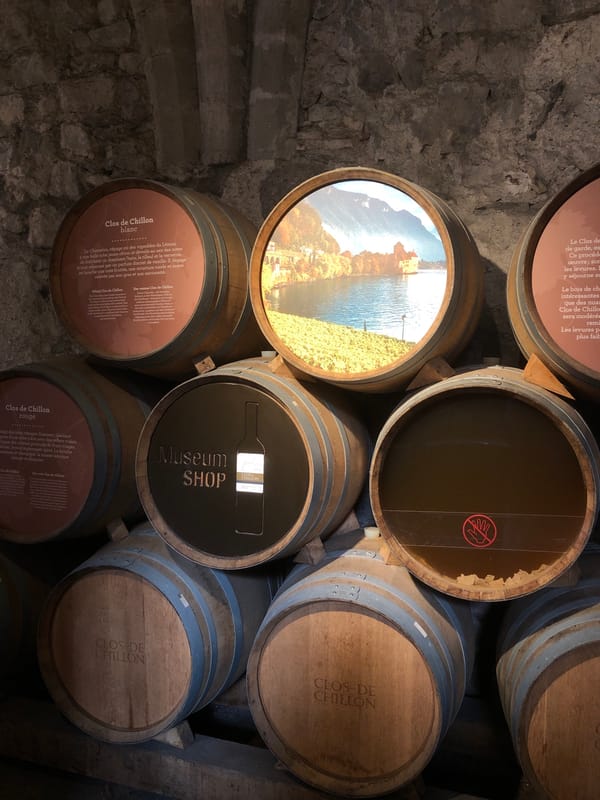 Tourist visits medieval Château de Chillon displays in Switzerland
