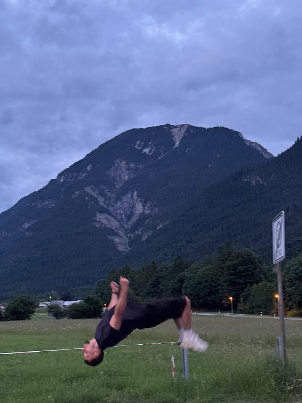 Person performs parkour and athletic stunts in Garmisch-Partenkirchen