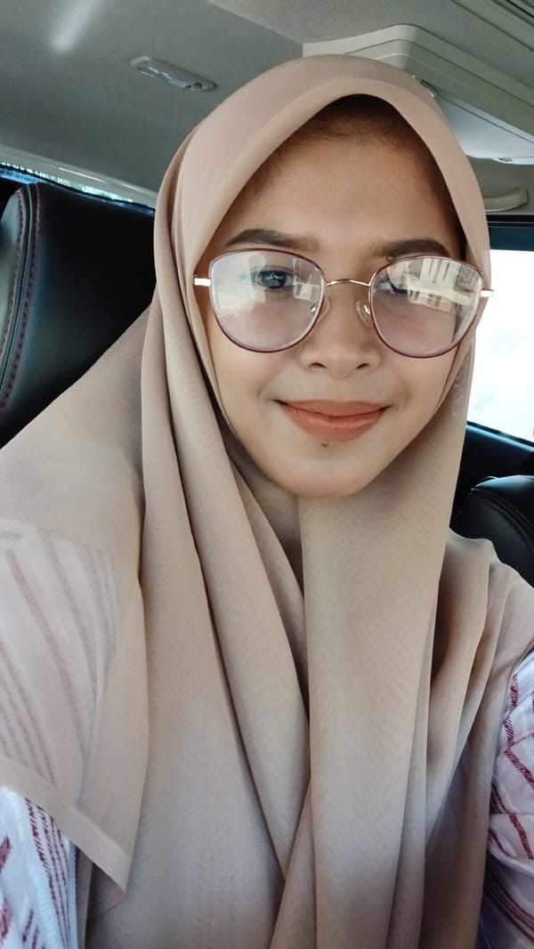 Woman takes car selfie in Lhokseumawe, Indonesia