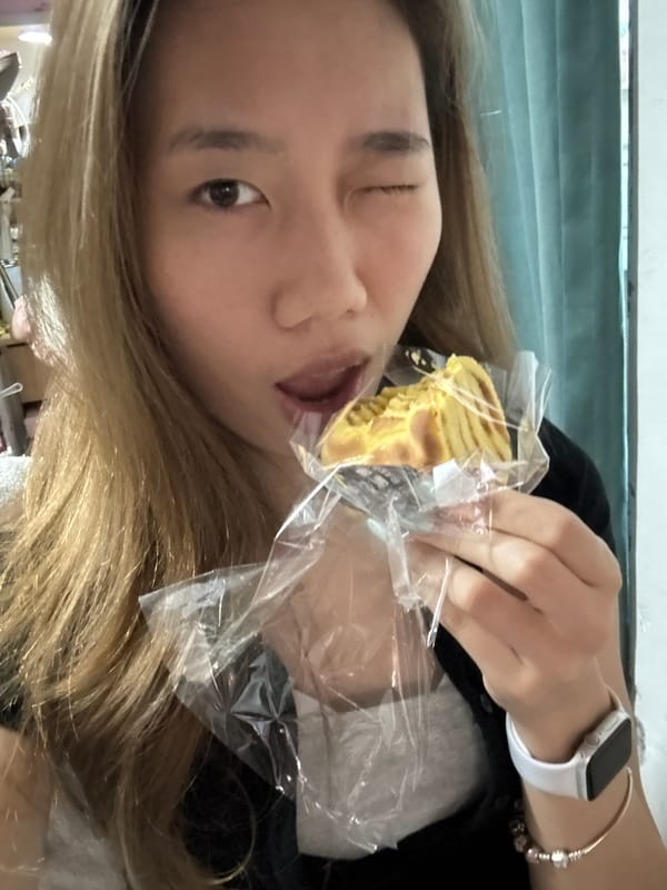 Woman poses with pastry in playful photos in Nan'an District