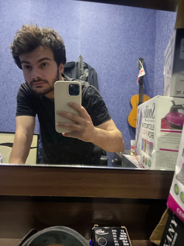 Young programmer documents coding session with selfies in Tbilisi