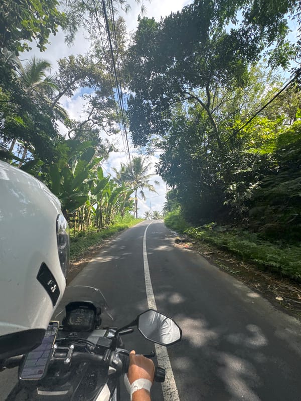 Tropical motorcycle ride ends at a cozy rustic cafe