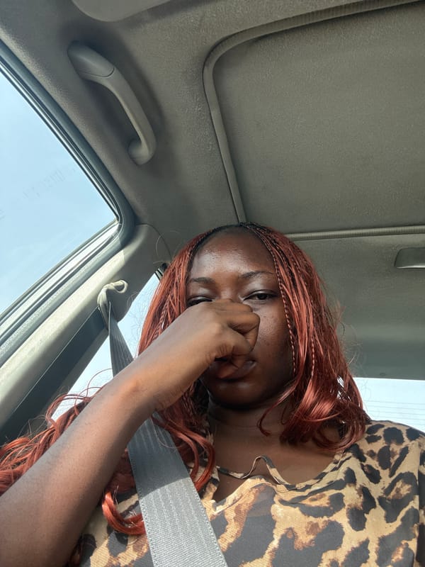 Portrait captured of young person in vehicle, Lugbe Nigeria